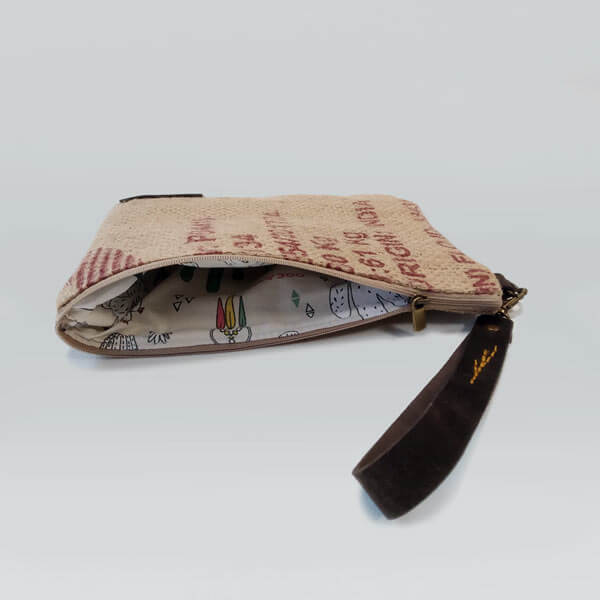 Monedero Kopi detalle del estampado interior de tela de algodón Monedero Kopi detalle del estampado interior de tela de algodón
